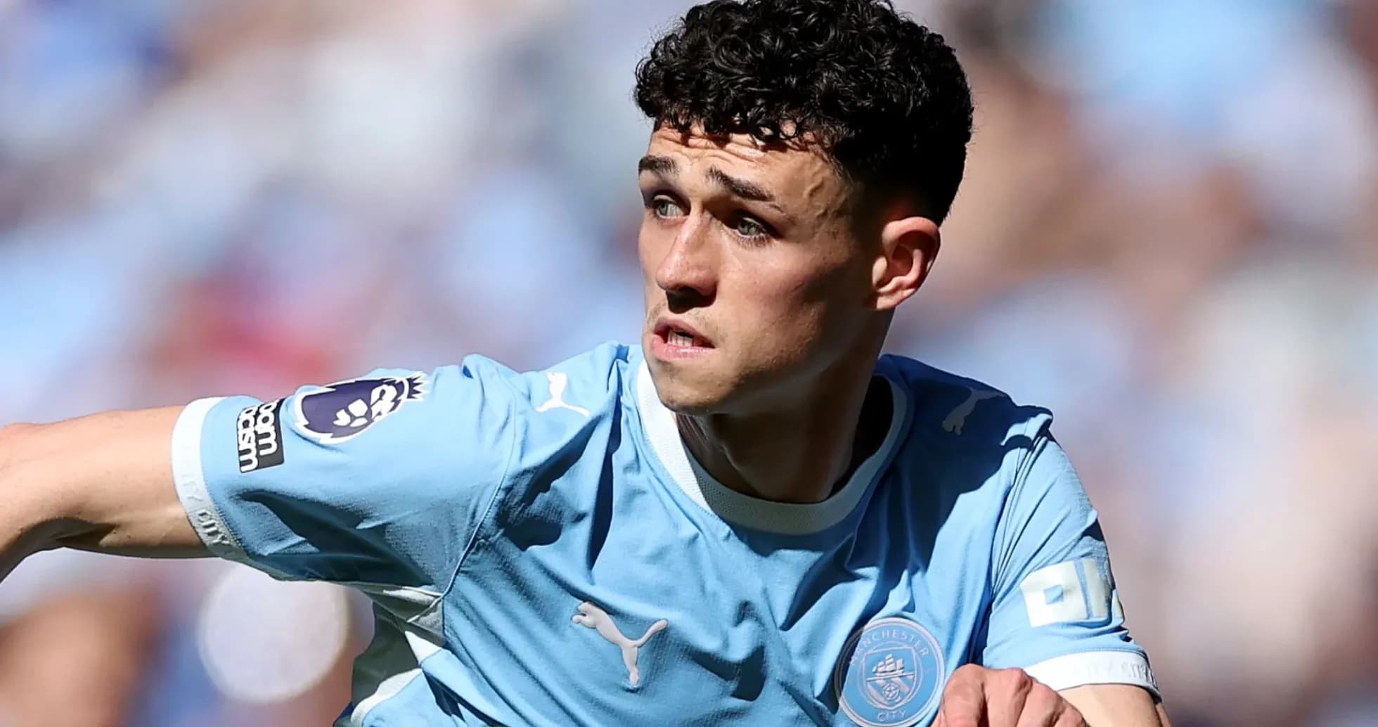 Игрок Manchester City на поле во время матча