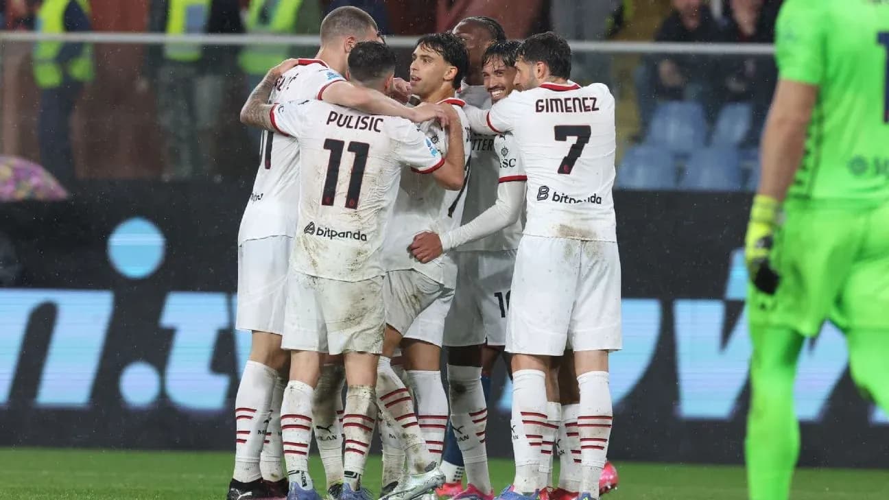Игроки AC Milan отмечают гол в дождливом матче Игроки AC Milan отмечают гол в дождливом матче