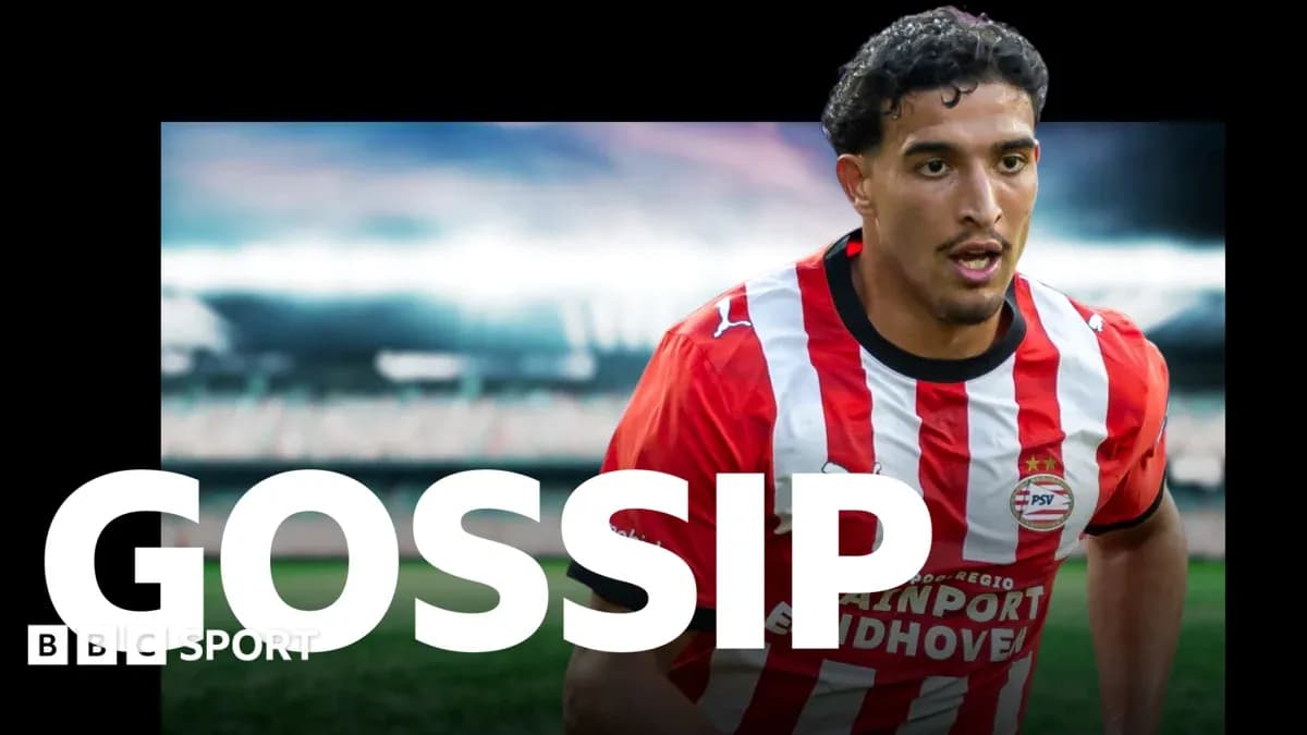 Игрок PSV в красно-белой форме на стадионе Игрок PSV в красно-белой форме на стадионе